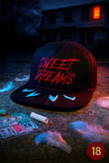 Black horror baseball cap embroidered with “Sweet Dreams” text and claw-mark details. Photographed at night outside a spooky house.