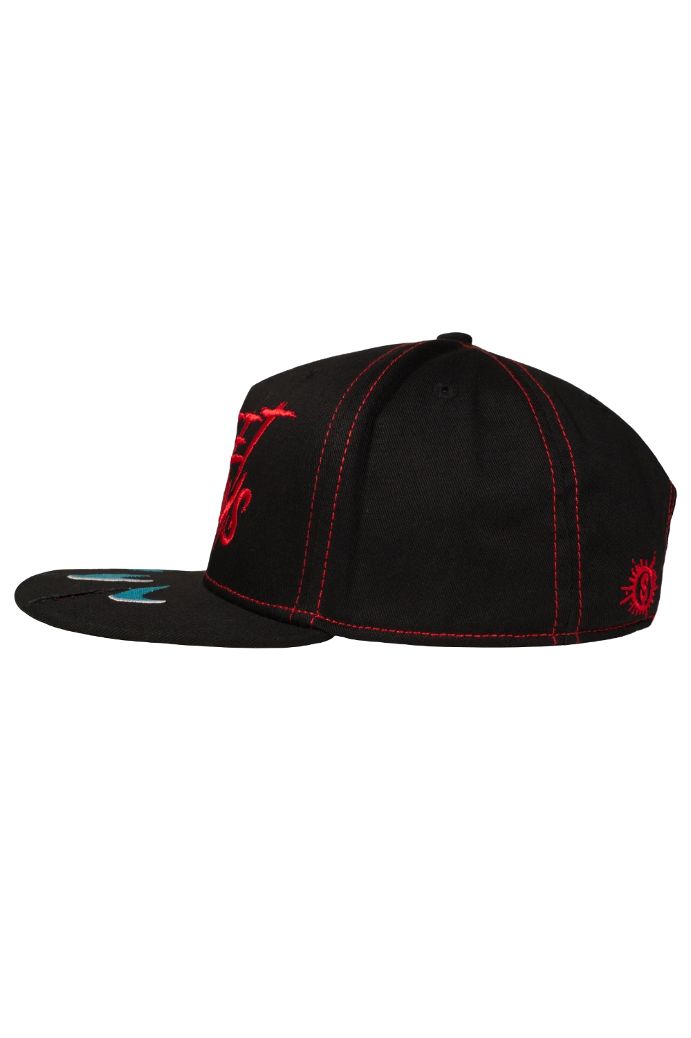 Side view of Sweet Dreams horror flat peak cap with red stitching and black cotton twill fabric